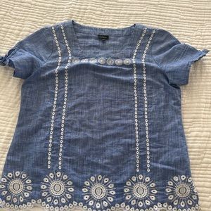 Talbots light blue cotton/linens blouse with embroidery on edges.